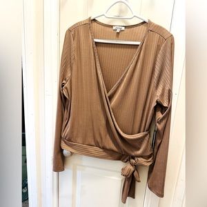 Never worn Silver Icing wrap around top